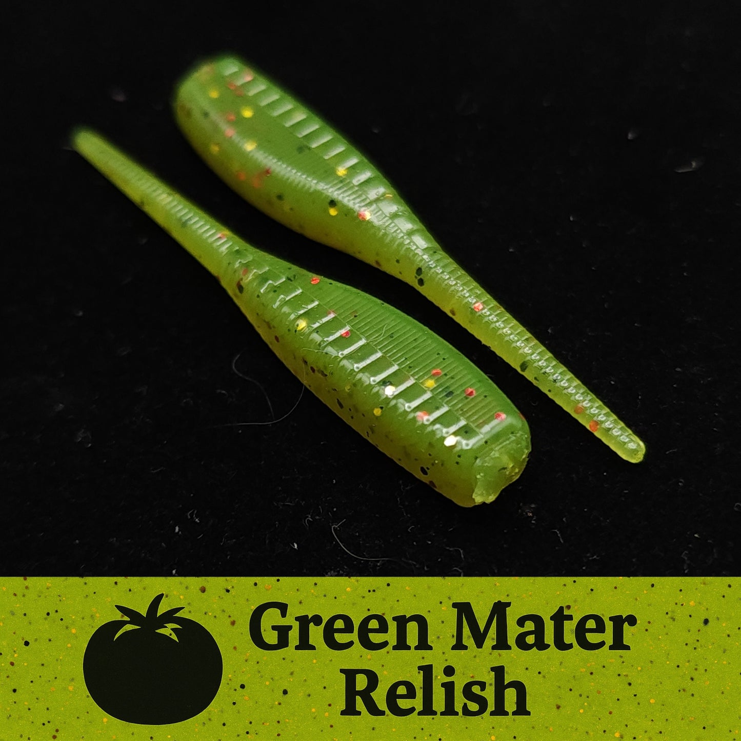 Two green fishing lures with speckles on a black background, labeled 'Green Mater Relish'.
