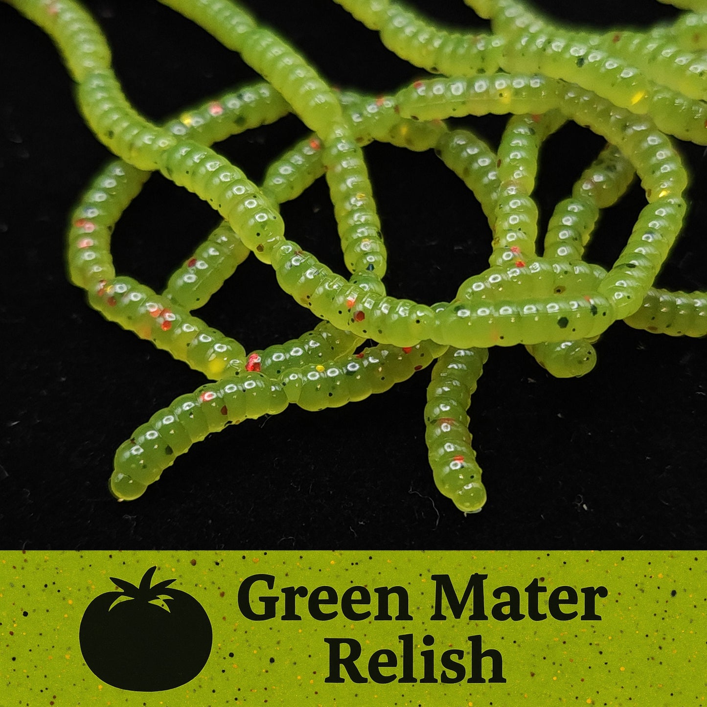 Green Mater Relish Micro Maggot Fly Larvae with a black background