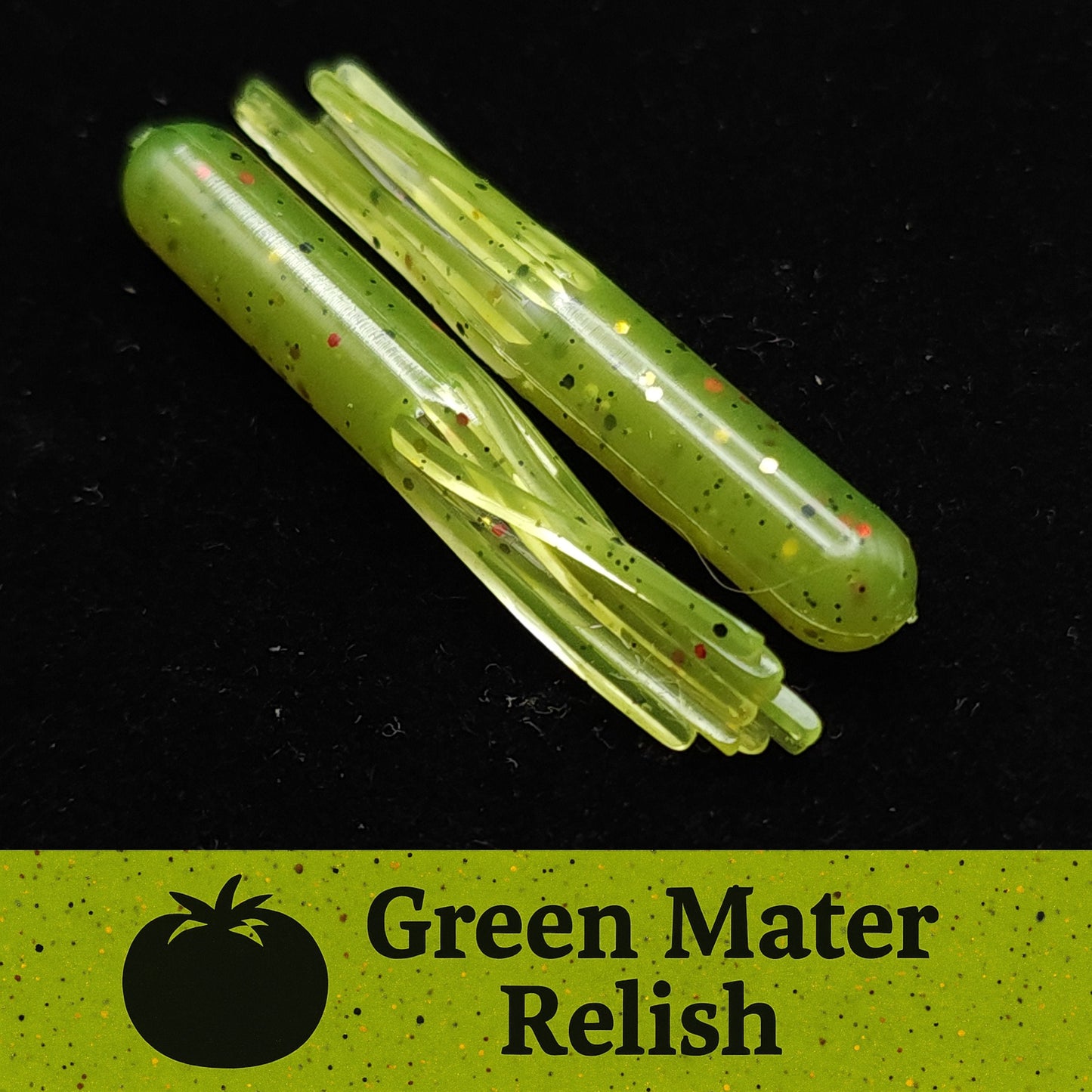 Two green fishing lures with speckles on a black background, labeled 'Green Mater Relish'.