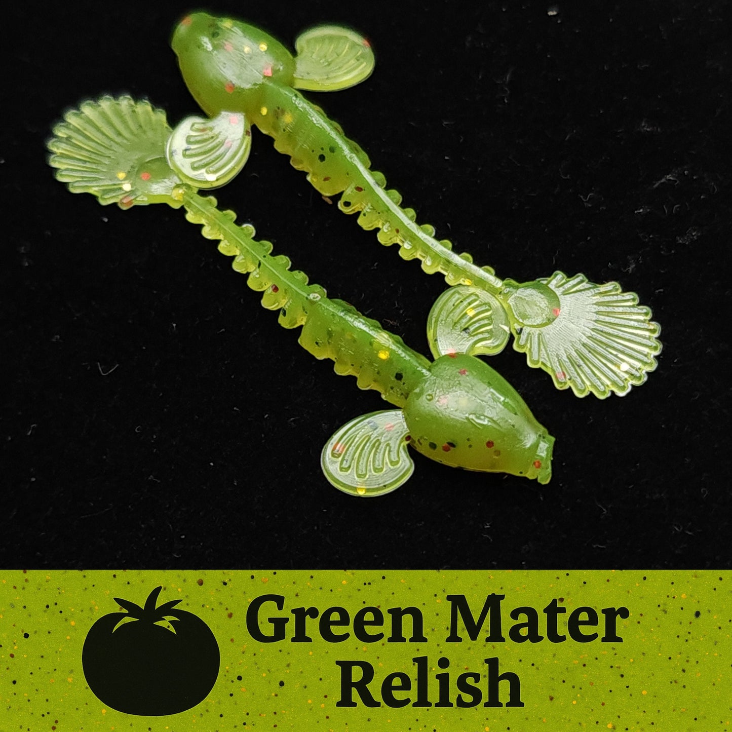 Green fishing lure with scallop patterns on a black background, labeled 'Green Mater Relish'.
