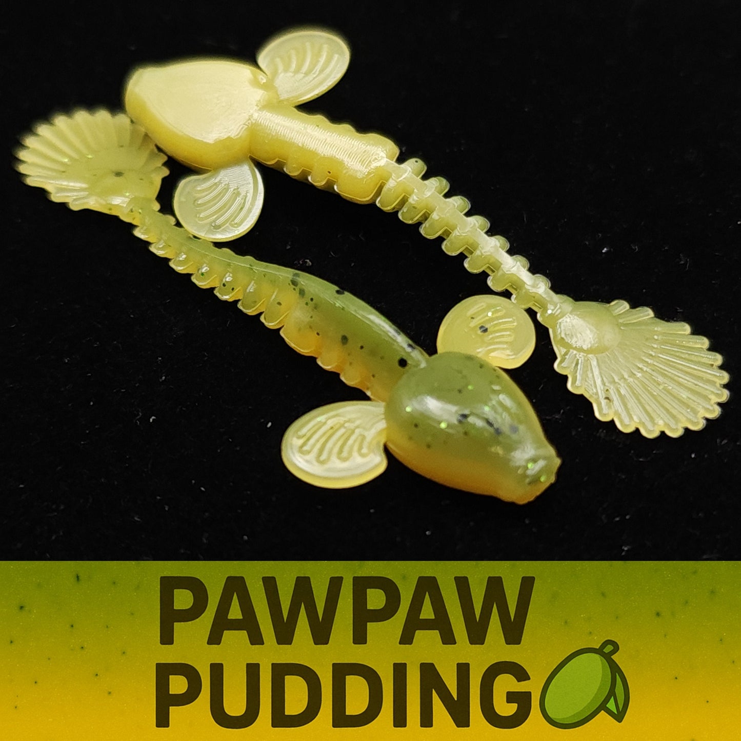 Yellow and green fishing lure with 'Pawpaw Pudding' text on a black background