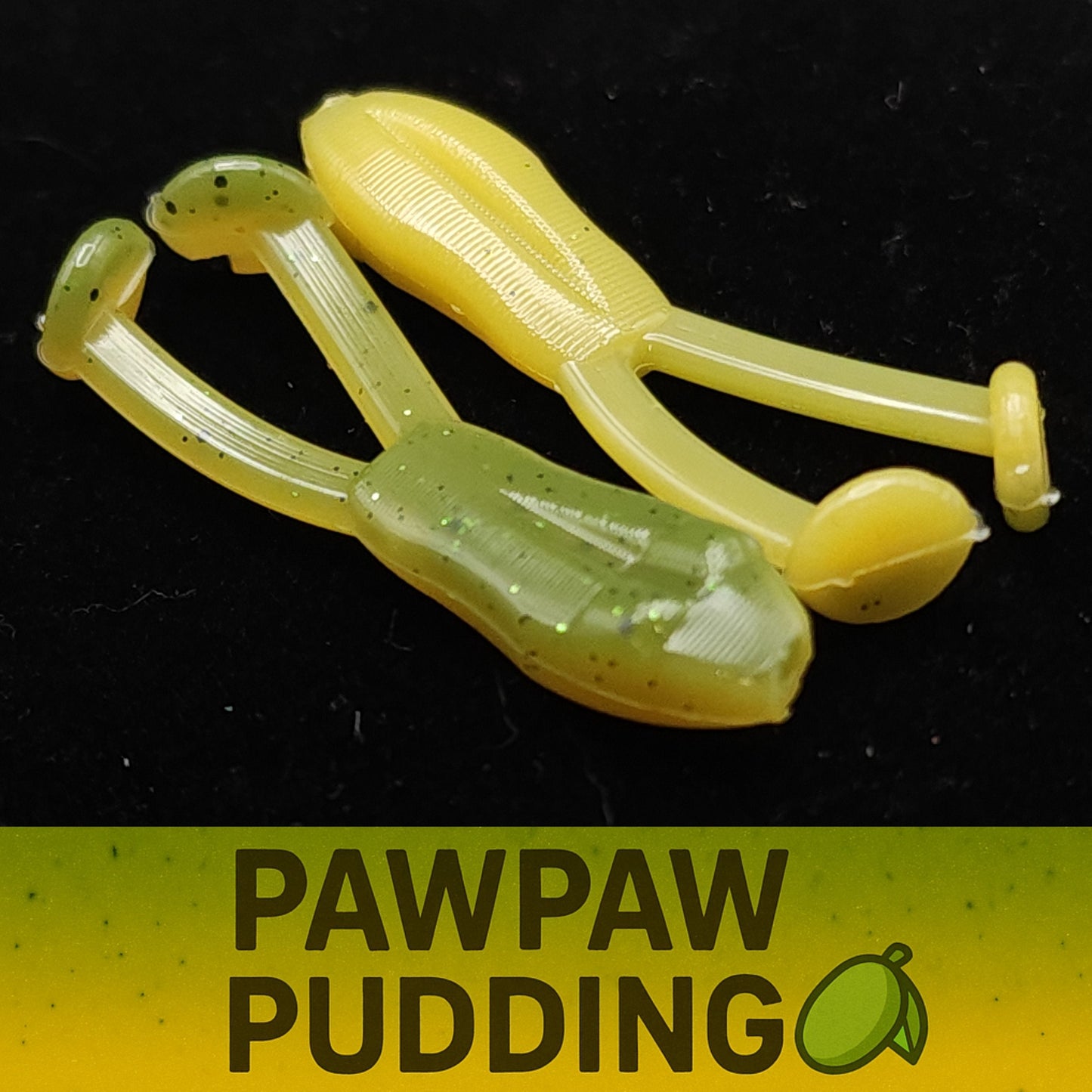 Yellow and green fishing lures labeled 'Pawpaw Pudding' on a black background