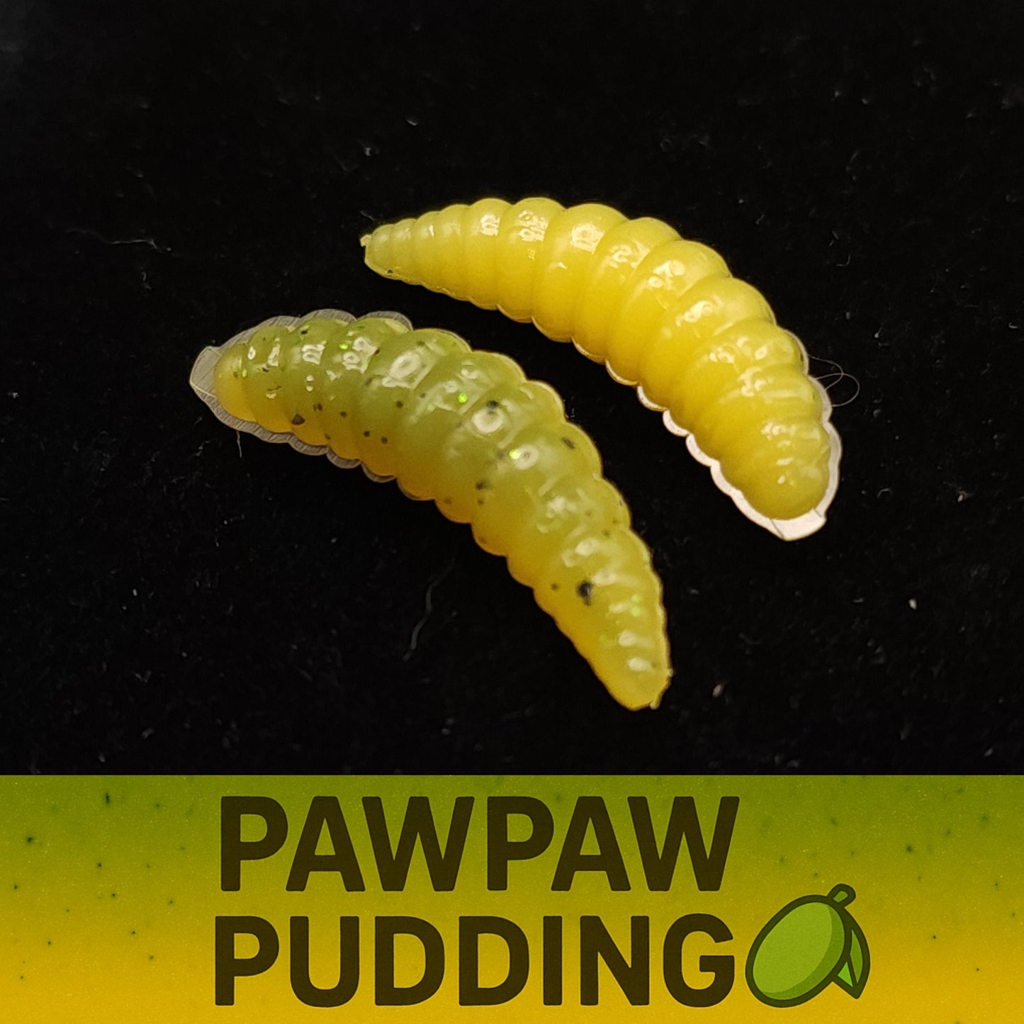 Two yellow larvae fishing lures on a black background with 'Pawpaw Pudding' text at the bottom.