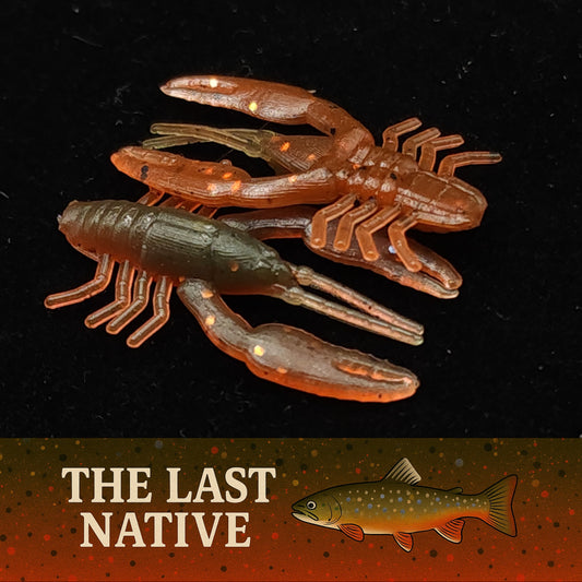 Two crawfish-shaped fishing lures on a black background with 'The Last Native' branding.