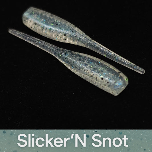 Two fishing lures labeled 'Slicker'N Snot' on a black background