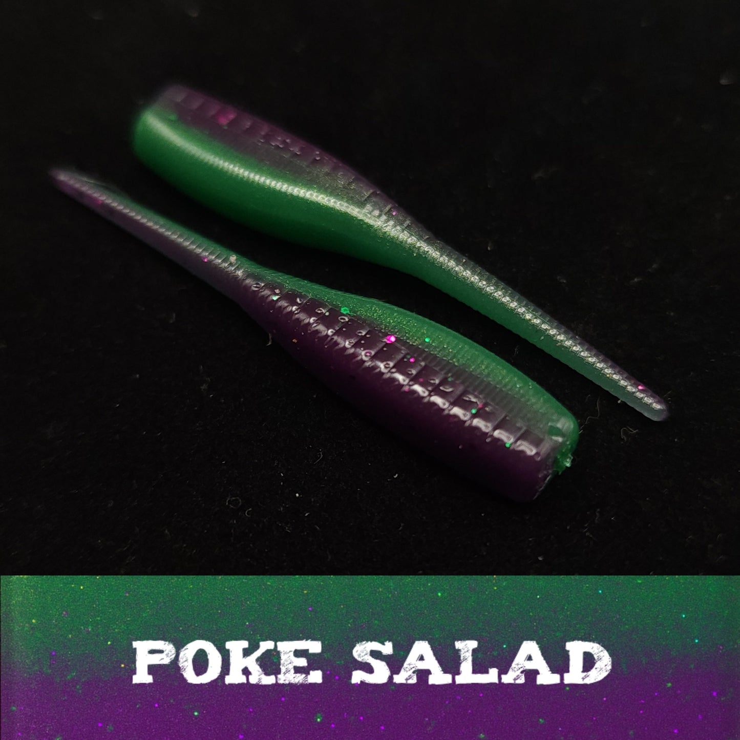 Two green and purple fishing lures on a black background with 'POKE SALAD' text.