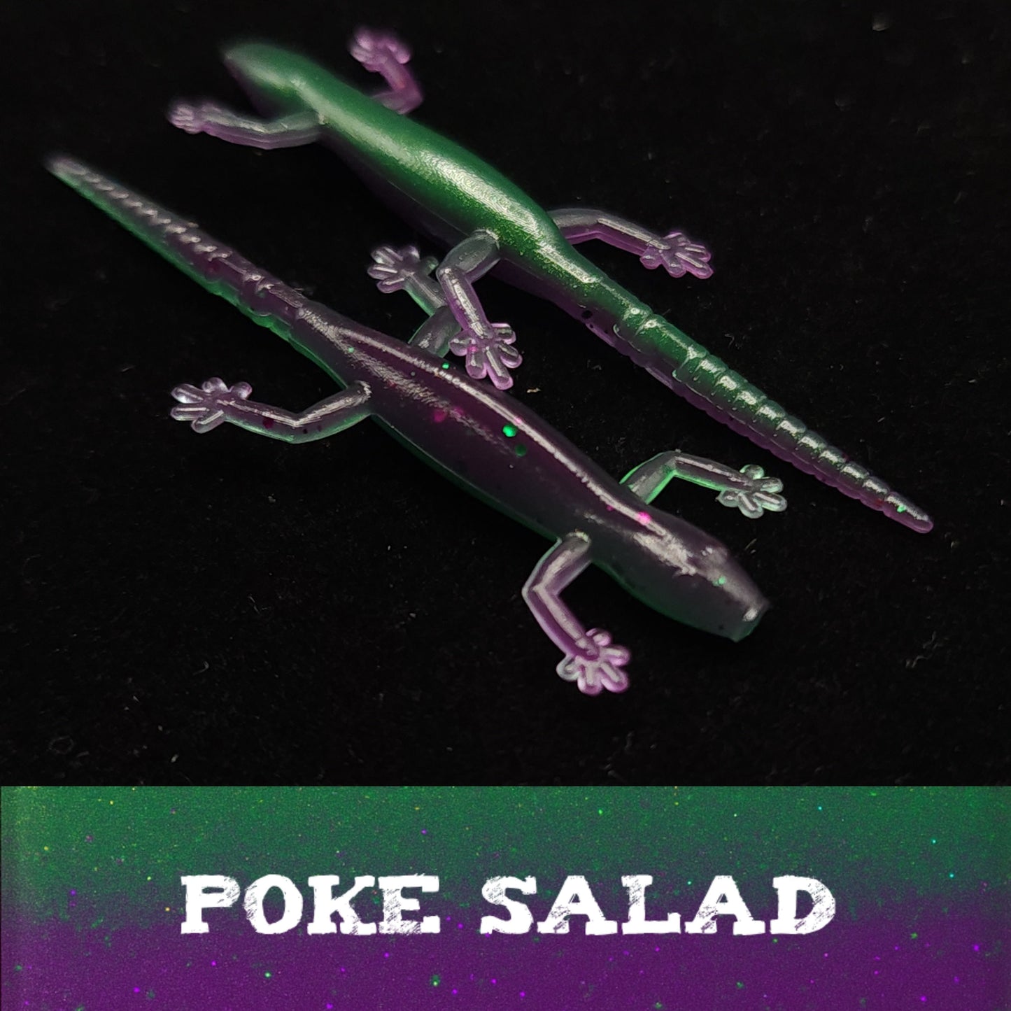 Glowing green and purple lizard-shaped lure on a dark background with 'POKE SALAD' text.
