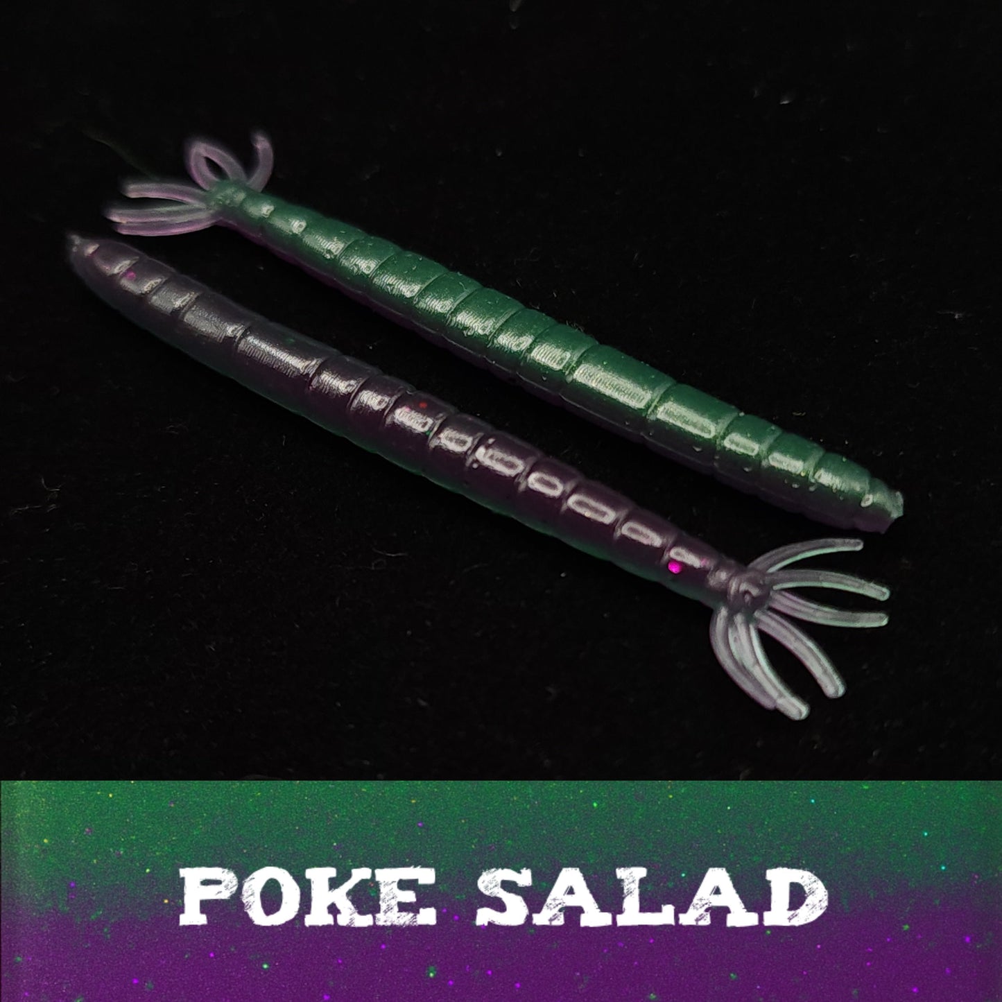 Two green and purple fishing lures on a black background with 'POKE SALAD' text.