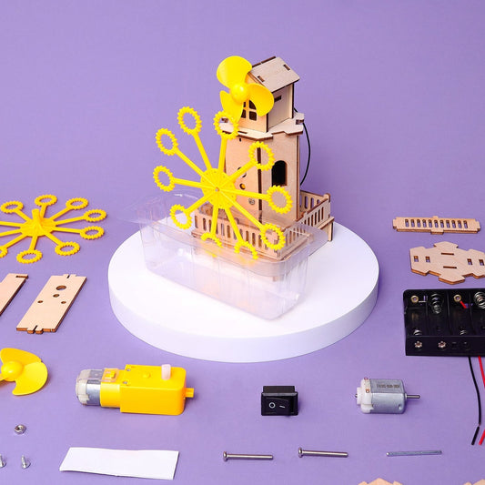 Mechanical model kit with components on a purple background