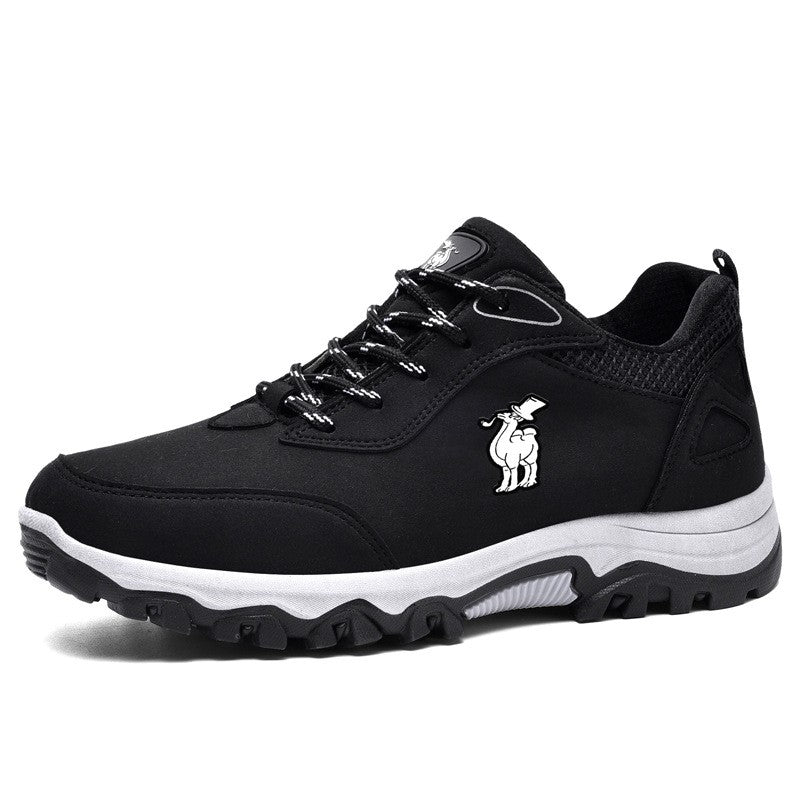 Black sneaker with white sole on a white background