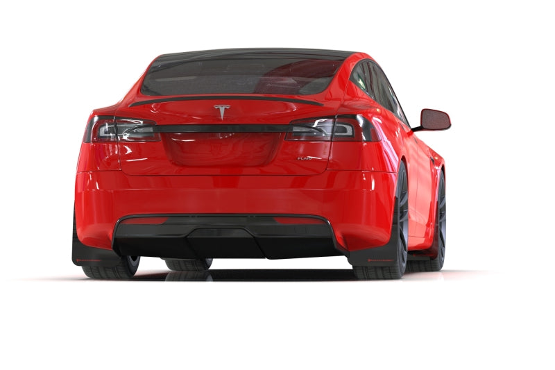 Red Tesla car on a white background