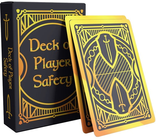 Playing cards with gold and black design on a white background