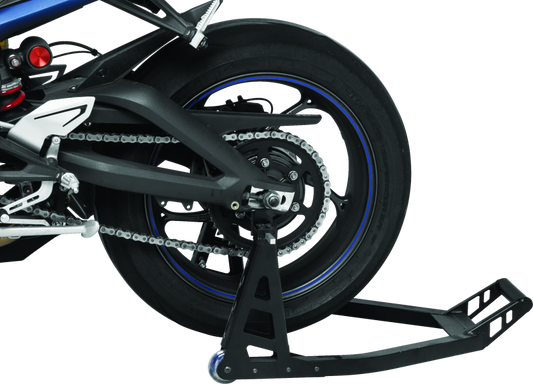 Close-up of a motorcycle wheel and chain on a white background