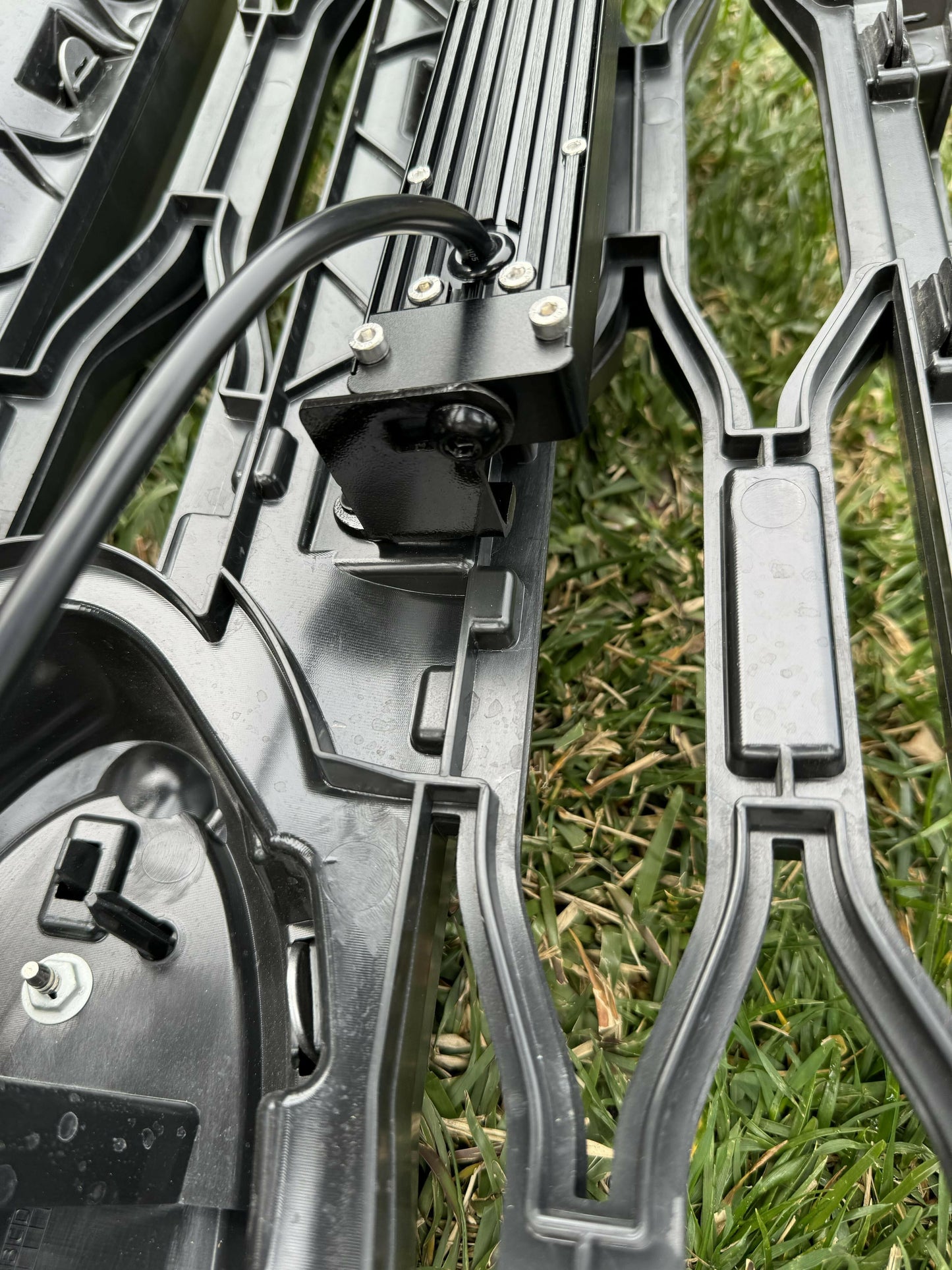 Close-up of  LED Light Bars with grass underneath