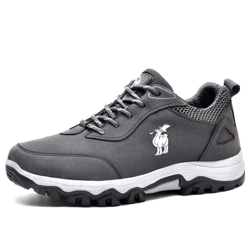 Black hiking shoe with red accents and 'Camel' branding on a white background