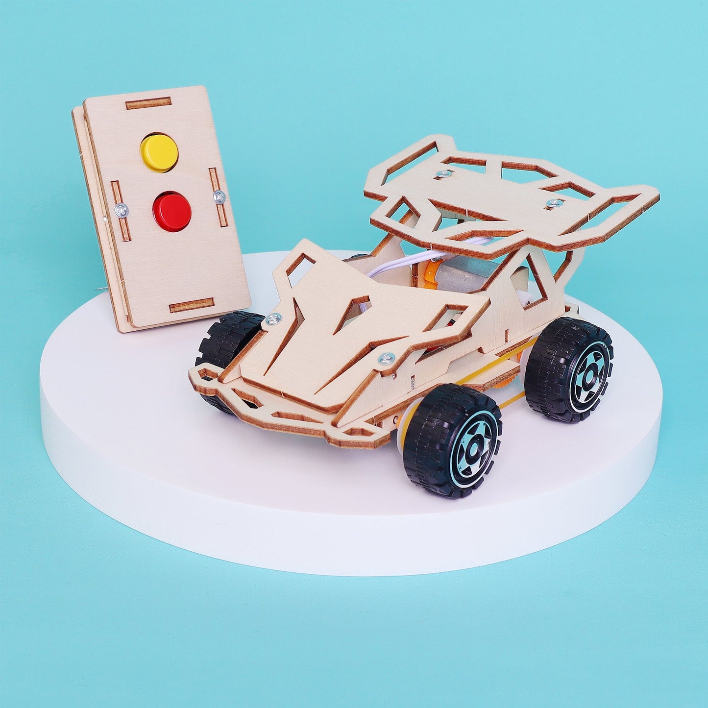Wooden model car kit with control panel on a blue background
