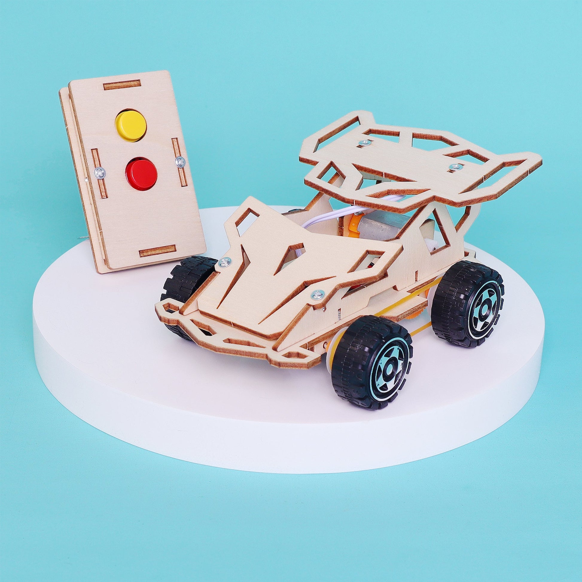 Wooden model car kit with control panel on a blue background
