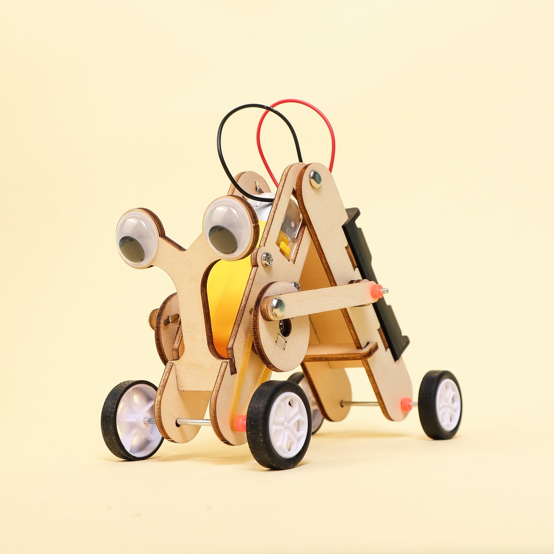 Wooden robot vehicle with wheels and a yellow interior on a beige background