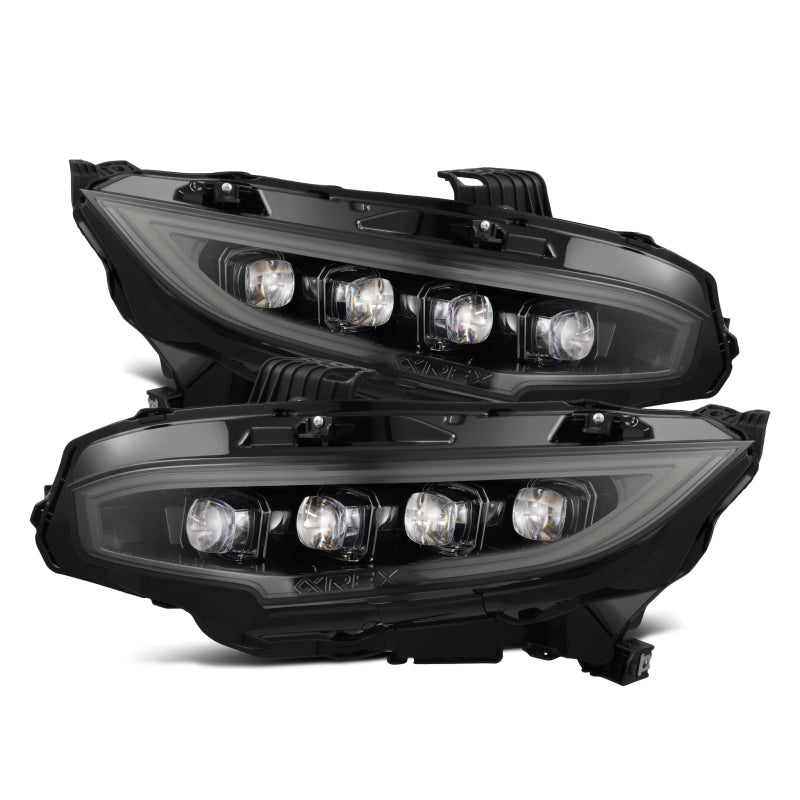 Pair of black car headlights on a white background