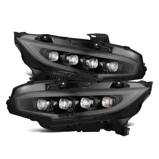 Pair of black car headlights on a white background