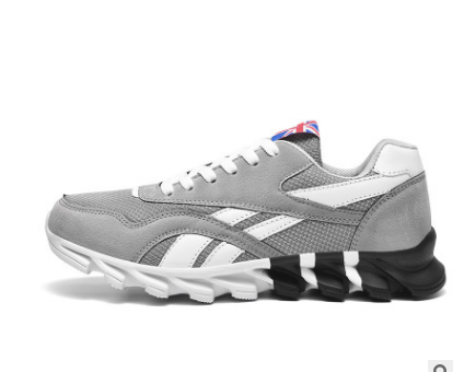 Gray and white sneaker with black sole on a white background