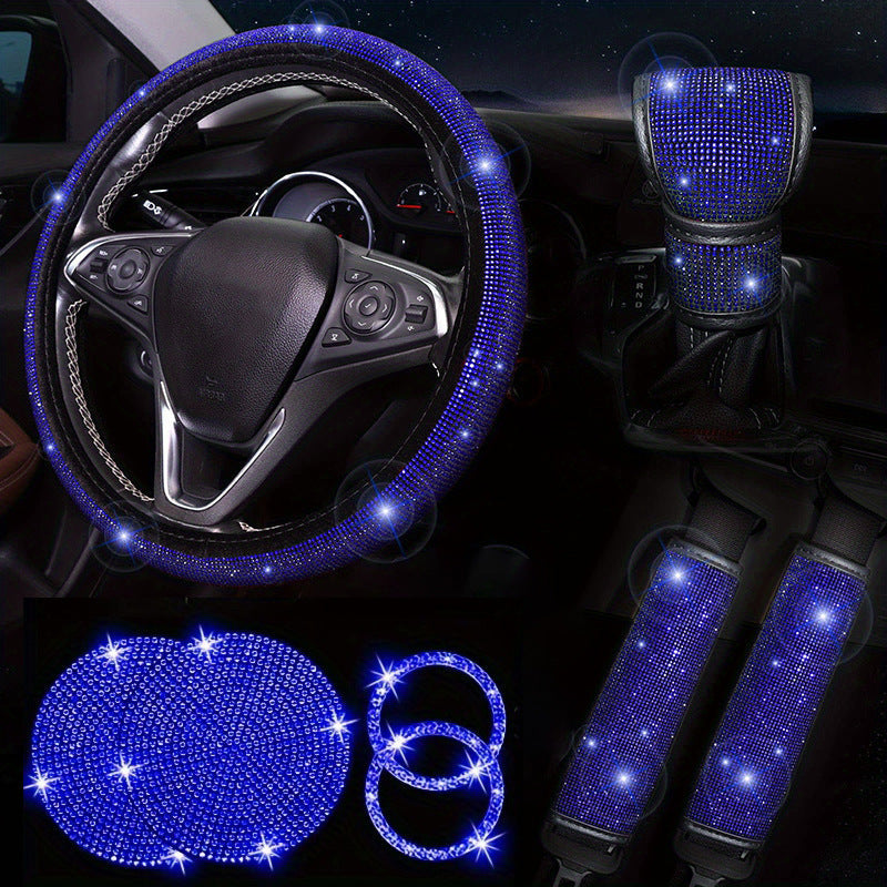 Car interior set with blue rhinestone steering wheel cover, gear shift cover, and coasters.