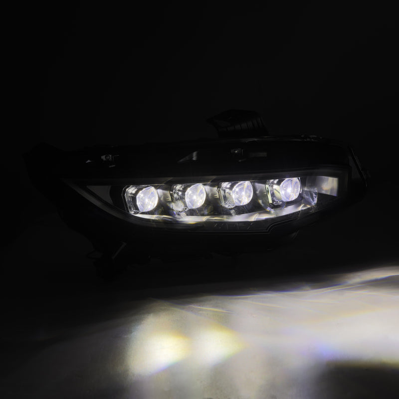 Car headlight with multiple LED lights on a dark background