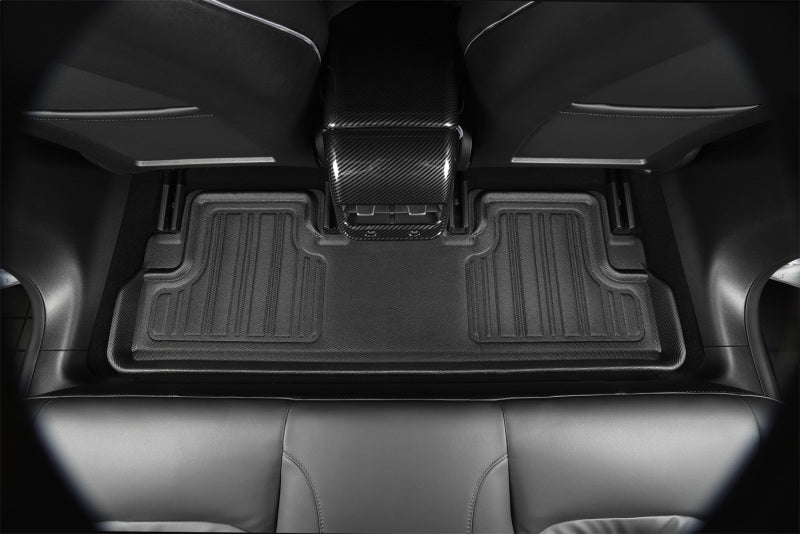 Car floor mats with a seat belt in a vehicle interior