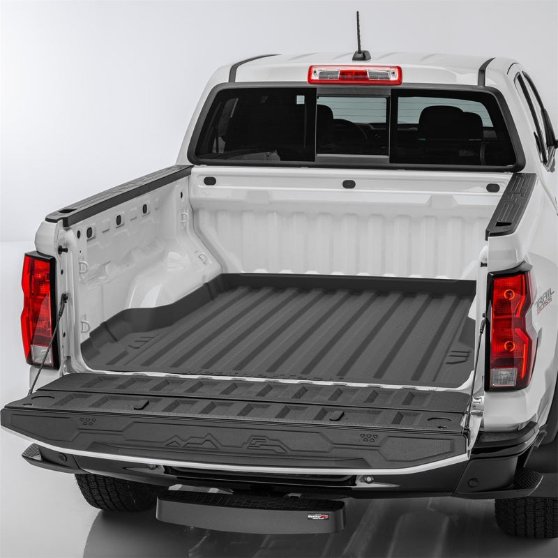 White pickup truck with an open bed on a white background