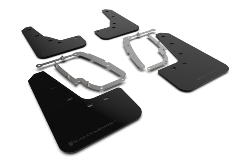 Set of black car mud flaps with metal brackets on a white background