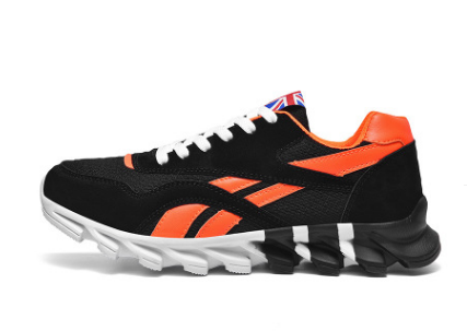 Black and orange running shoe with white sole on a white background