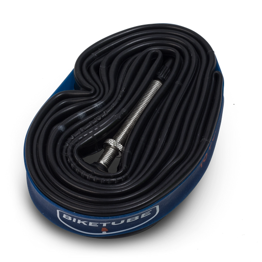 Bicycle inner tube with valve on a checkered background