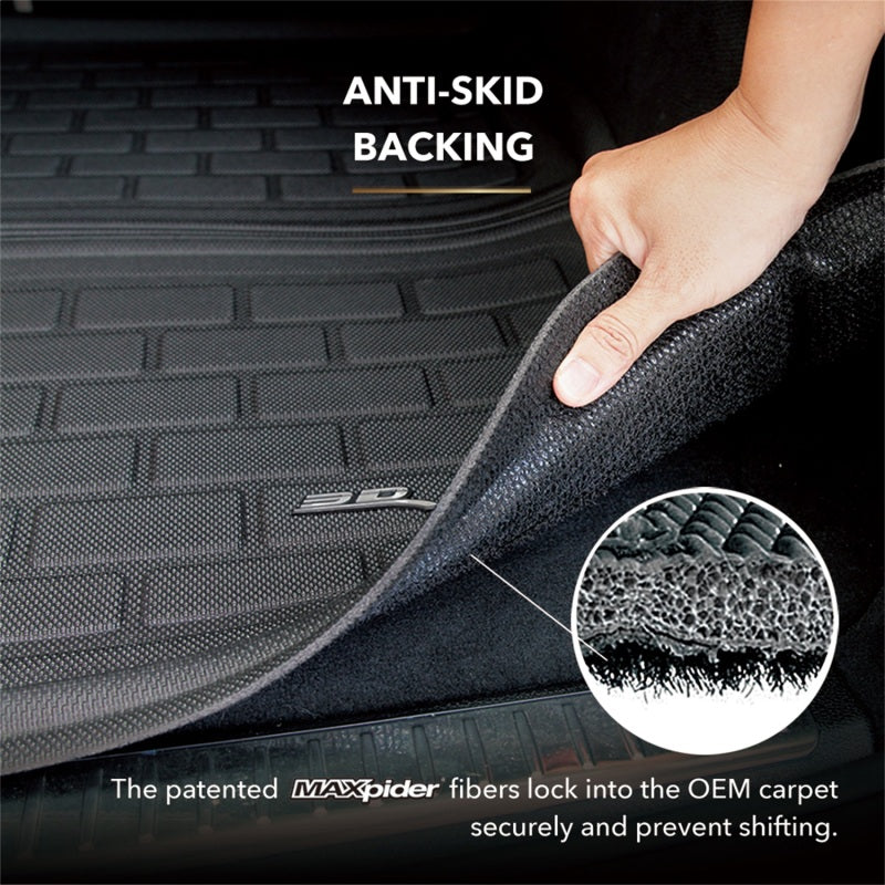 Car mat with anti-skid backing and MAXpider branding, showing a hand holding the mat.