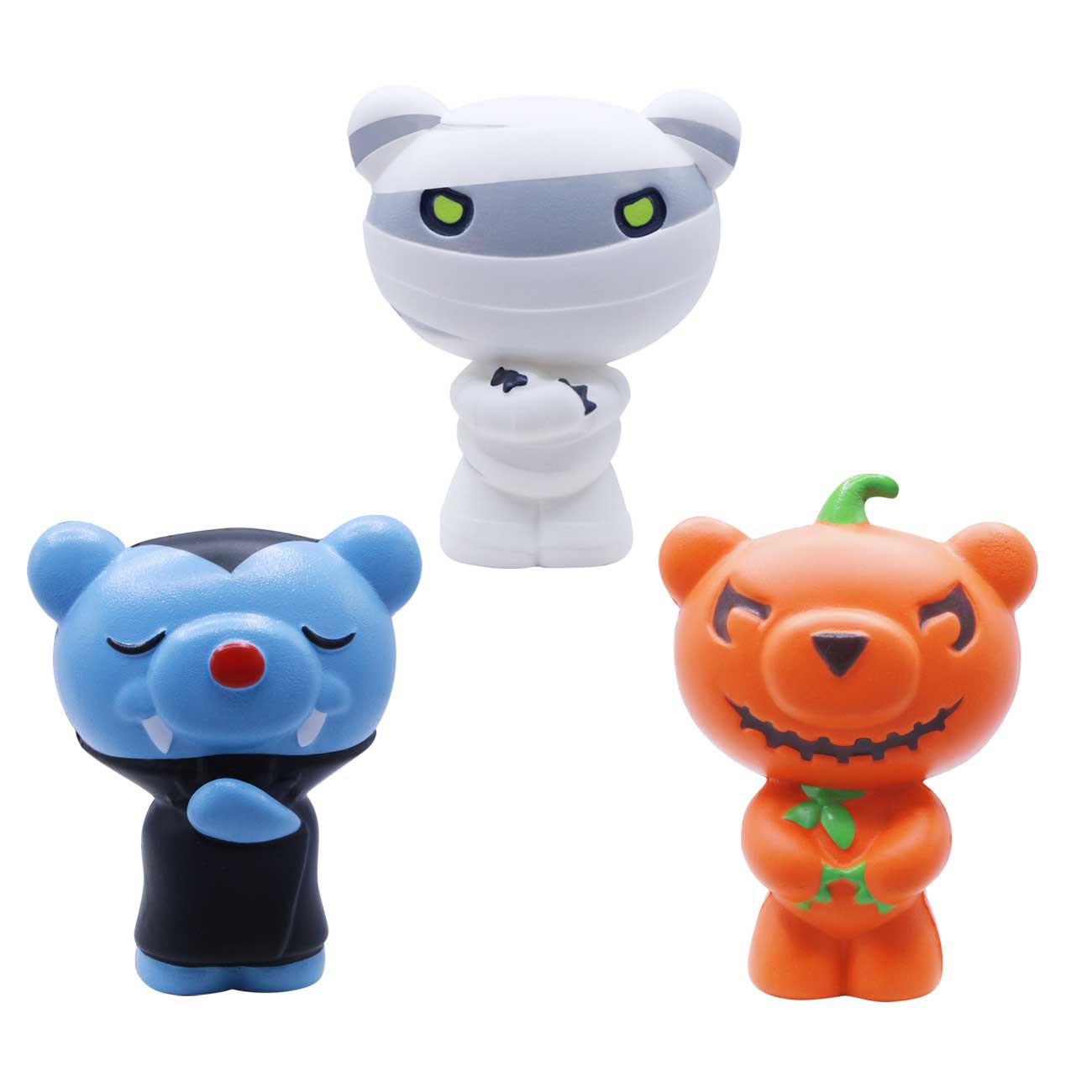 Three Halloween-themed figurines on a white background