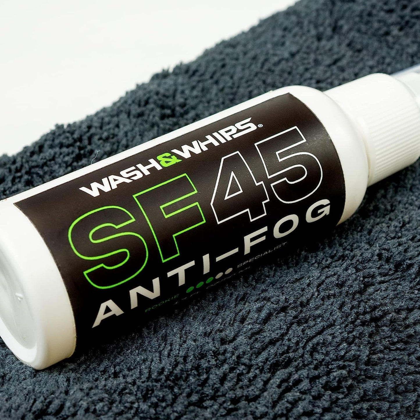 Wash & Whips SF45 Anti-Fog product on a textured black surface