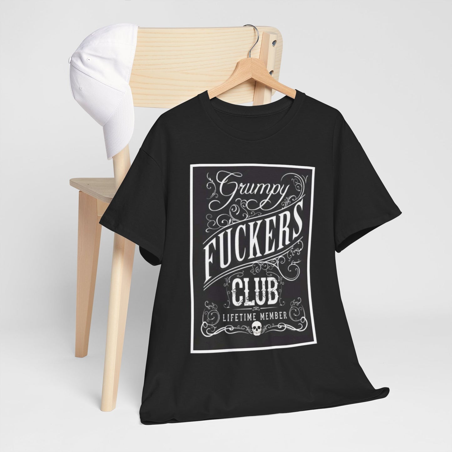 Black Grumpy F*ckers Club Unisex Heavy Cotton Tee on a hanger