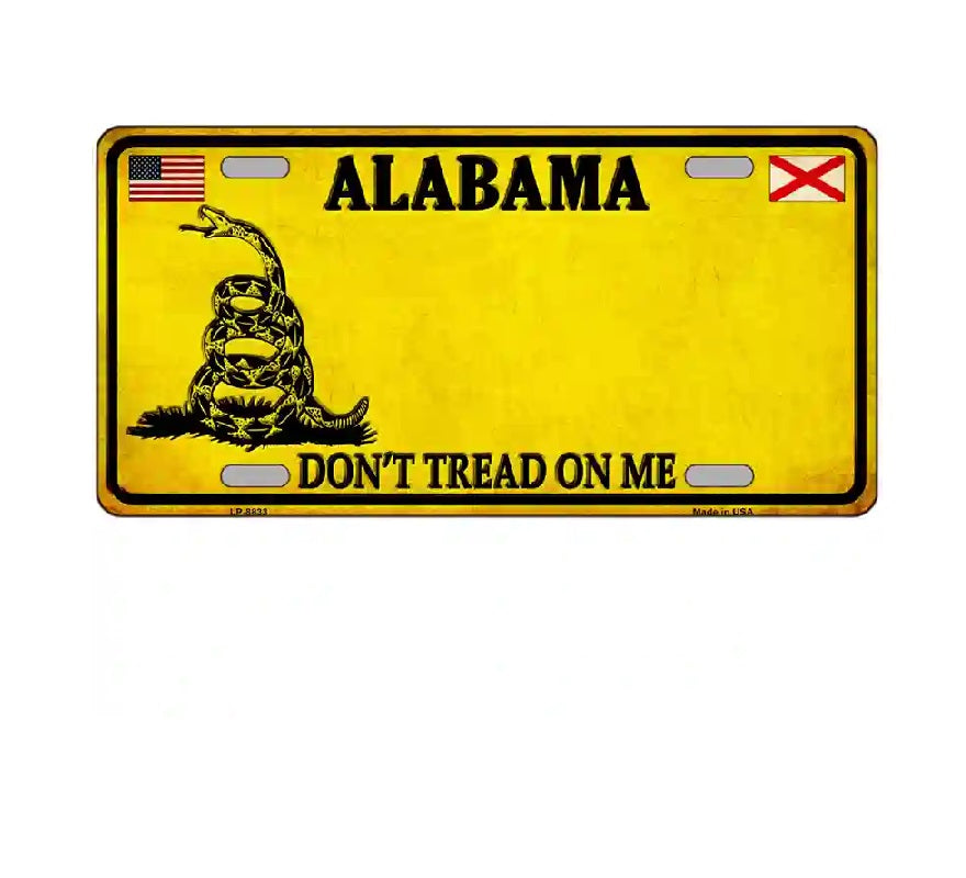 Yellow license plate with 'Alabama' and 'Don't Tread on Me' text, featuring a snake and American flag design.