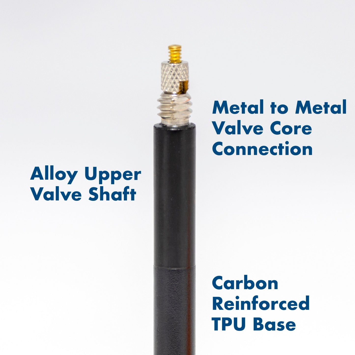 Black valve core with metal components on a white background