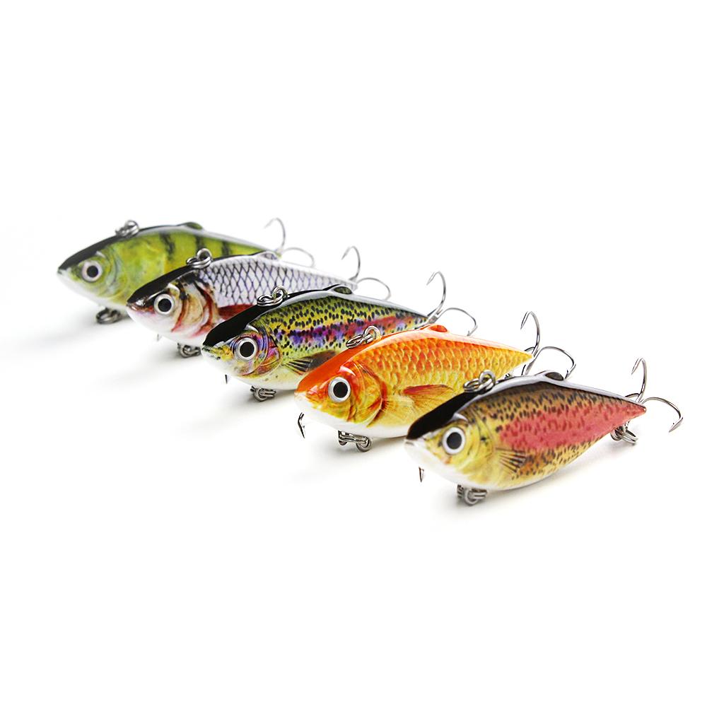 Five colorful fishing lures on a white background