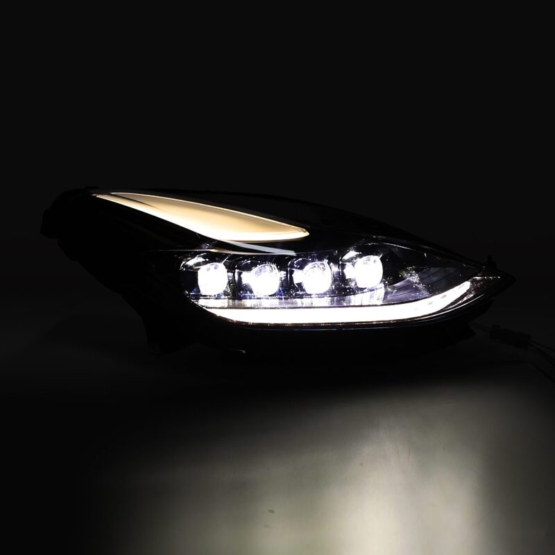 Car headlight with LED lights on a black background