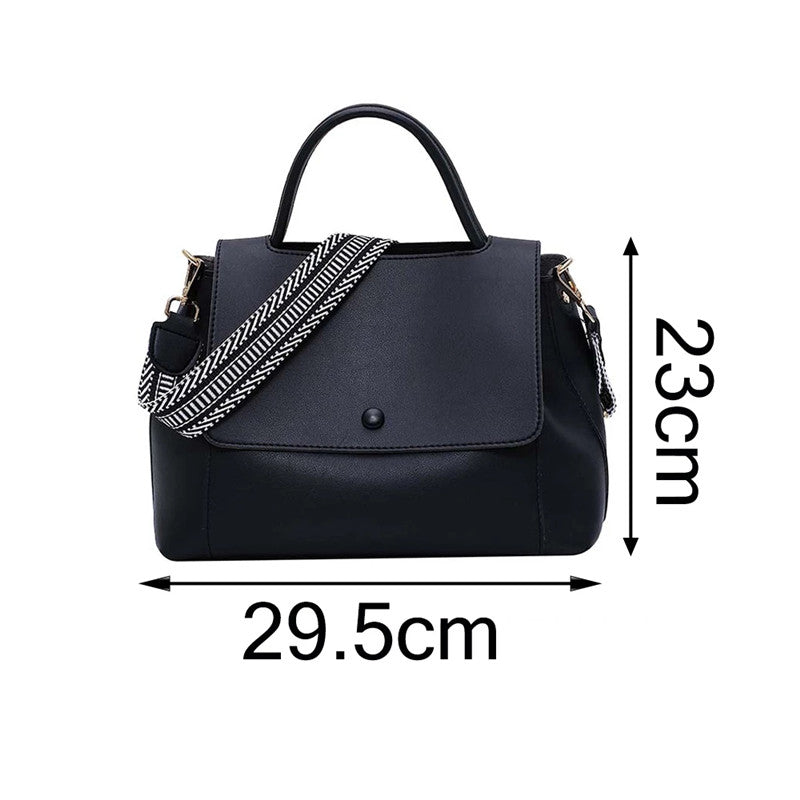 Black handbag with measurement details on a white background