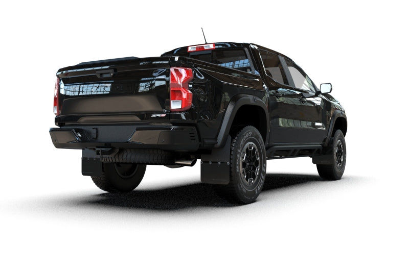 Black pickup truck shown from a rear three-quarter angle on a white background