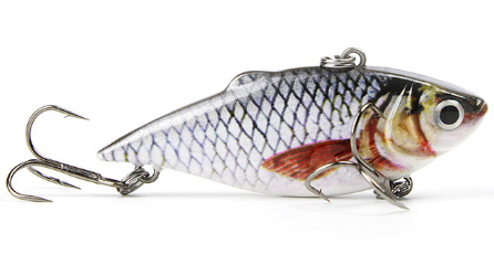 Fishing lure resembling a fish with a hook on a white background