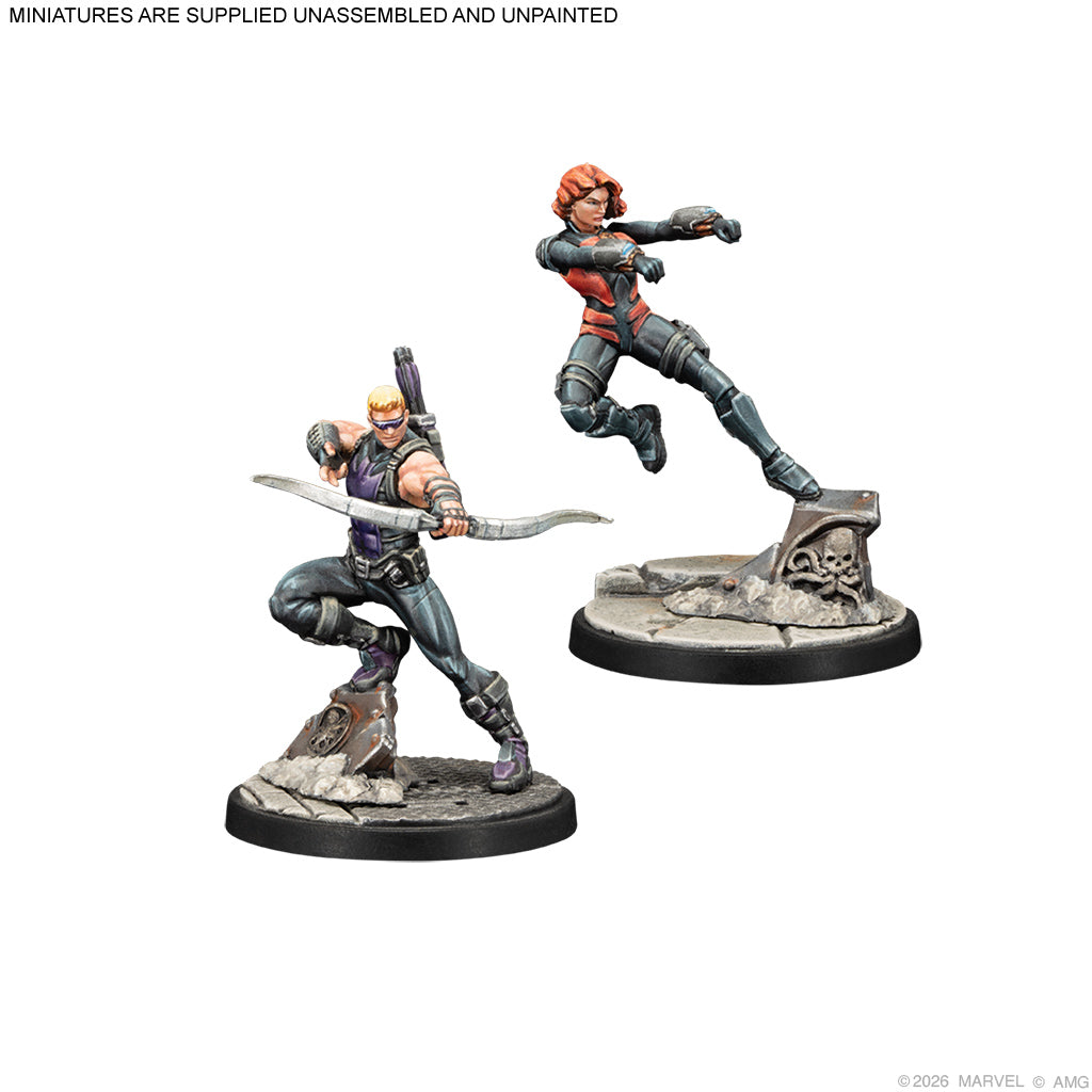 Two miniature figures on stands with a white background