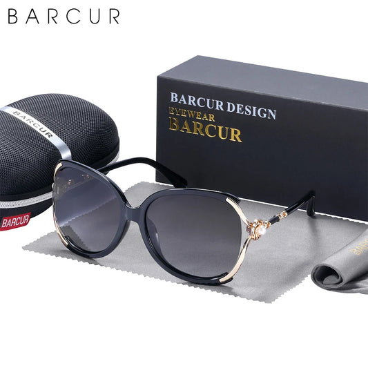 Barcur sunglasses with case and box on a white background