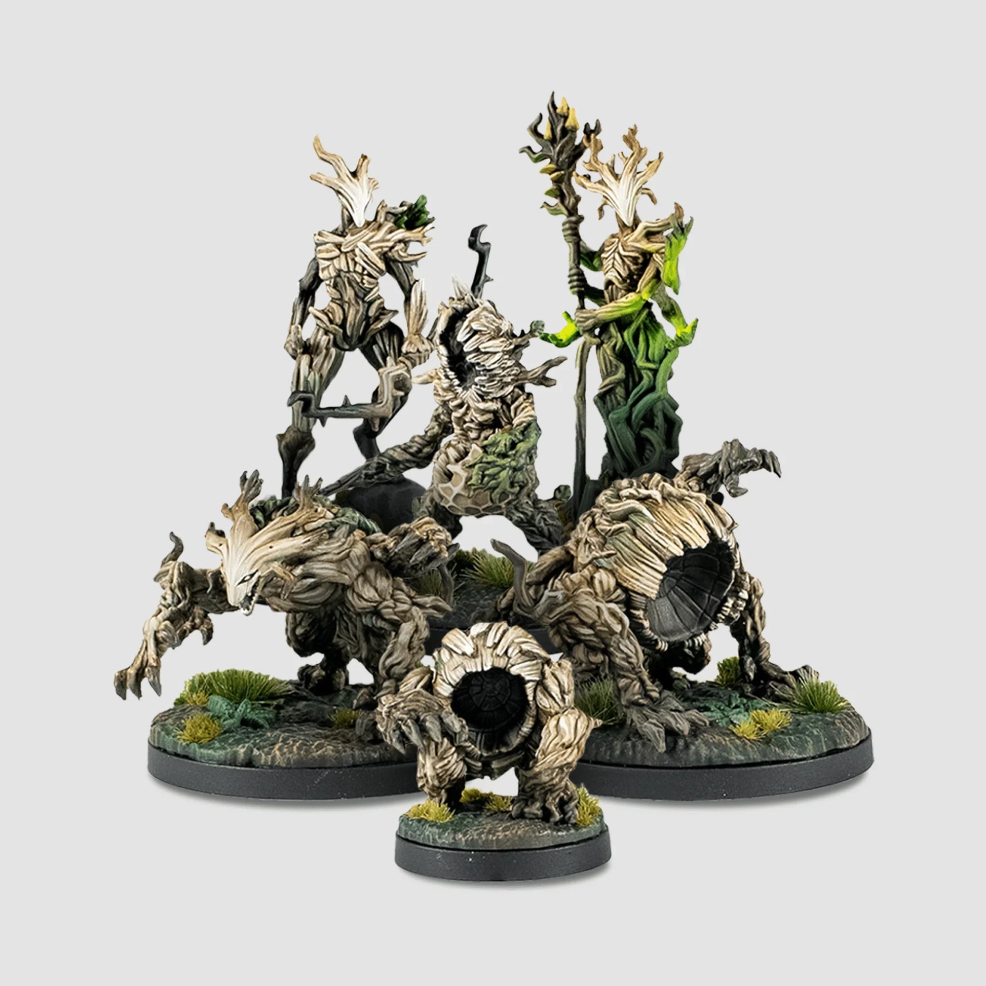 Fantasy figurines on a gray background