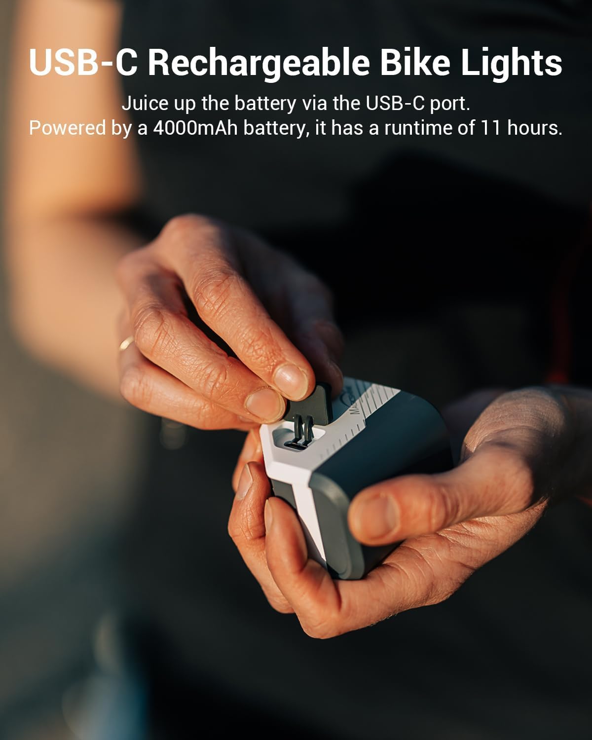 USB-C rechargeable bike light held in hands with product details text above.