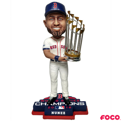 Bobblehead of a red sox baseball player holding a trophy with 'FOCO' branding on a white background
