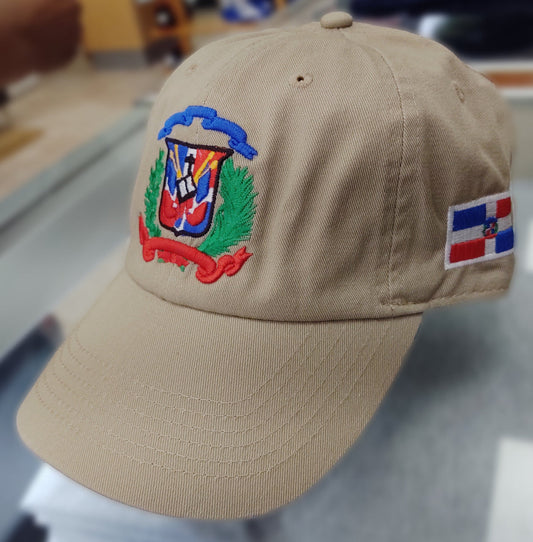 Beige cap with Dominican Republic emblem and flag patch on a blurred indoor background