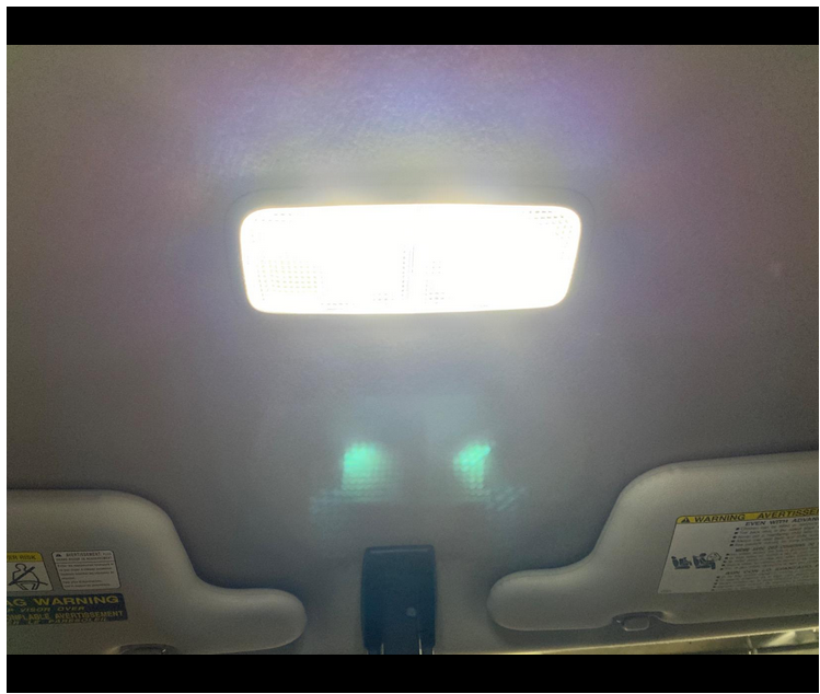 Car interior light fixture with a bright light source